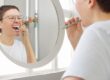 Adult brushing teeth for daily oral hygiene