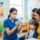 Child dental checkup with family in clinic