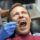 Dentist examining a patient's teeth during a dental checkup.